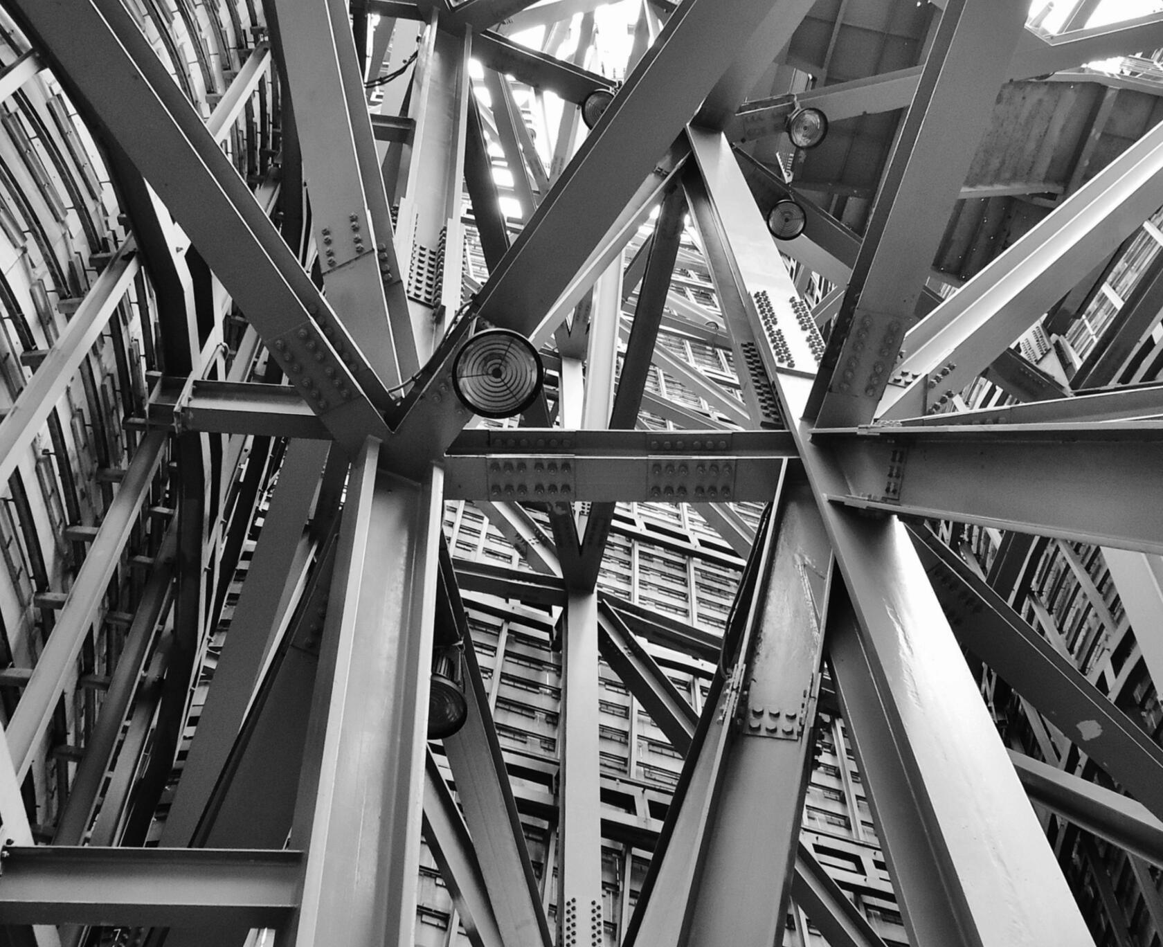 Steel Beams Construction Steel Beams black and white high rise in background